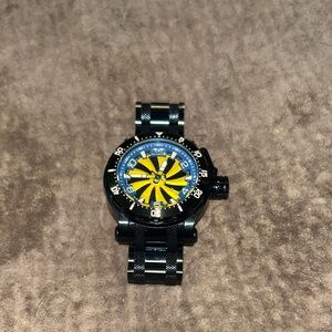 Invicta Black and Yellow Watch with Spinning Turbing.